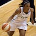 Minnesota Lynx guard Candice Wiggins (11) drives to the basket during a WNBA preseason basketball game against the Connecticut Sun, on Thursday, May 1