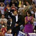 Barack and Michelle Obama were greeted by the crowd at the Xcel Energy Center on Tuesday night.