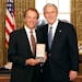 President George W. Bush stands with Ward Brehm, of Wayzata, Minn., after presenting him with the 2008 Presidential Citizens Medal Wednesday.