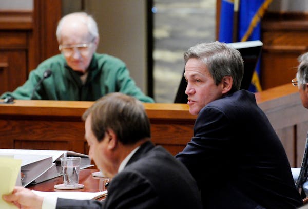 Republican Norm Coleman, right, listened to the testimony of Gerald Anderson, far left. At the end of the day, Coleman said of the witnesses: “You s