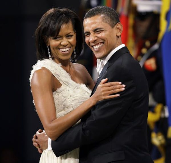 President Barack Obama and first lady Michelle Obama dance together at the Obama Home States Inaugural Ball in Washington.