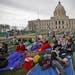 Young adults from around the Twin Cities gathered on the grounds of the capitol to participate in The Rescue.