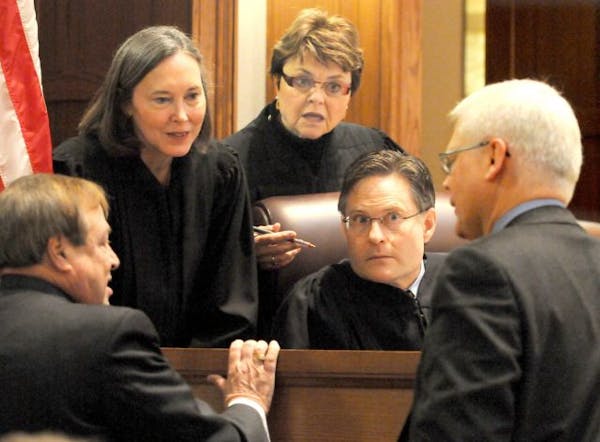 From left, the U.S. Senate election recount trial’s three-judge panel, Denise Reilly, Elizabeth Hayden and Kurt Marben, listened while Joe Friedberg