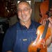 Andy Fein of Fein Stringed Instruments is a luthier -- he makes and repairs stringed instruments.