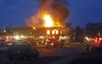 provided photo : credit Barbara Guttman fire at McMahon's Pub, lake street, Minneapolis, 6-6:30 am