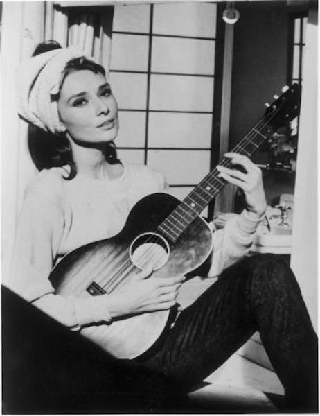 Audrey Hepburn crooned the Academy Award-winning song "Moon River" in the 1961 film "Breakfast at Tiffany's."