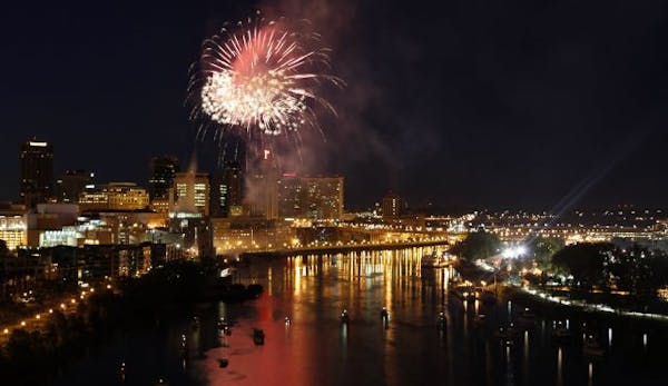 Fireworks light up the sky during the 2009 Taste of Minnesota on Harriet Island in St. Paul.