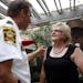 Susan Kimberly spoke with Sheriff Bob Fletcher at her retirement party Thursday at Burger Moe’s on W. 7th Street. She’s been a fixture in St. Paul