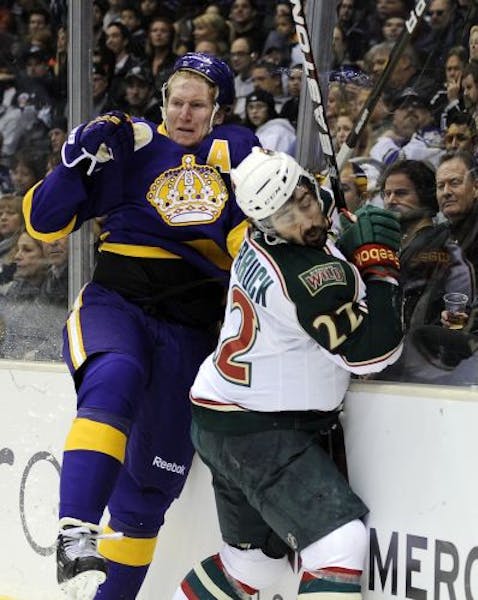 Wild right wing Cal Clutterbuck (right)