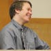 Michael Swanson smiles as the judge reads his guilty verdict Thursday for both murder and robbery in the first degreee.