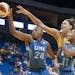 Minnesota Lynx's Charde Houston (24) is fouled on a reach by Tulsa Shock's Liz Cambage during the second quarter of a WNBA basketball game Thursday, J