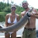 Brenna Burley and Josh Stanek of Grand Rapids caught a 56-inch sturgeon on the Rainy River near Baudette.