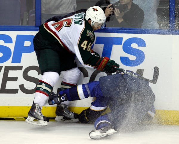 Wild defenseman Jared Spurgeon sent Blues center Philip McRae into the boards, drawing a boarding penalty, in the third period of Thursday's preseason