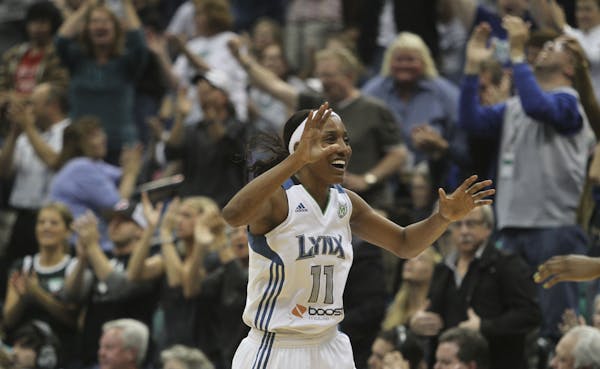 Lynx reserve Candice Wiggins celebrated as the Mercury called timeout in the second half of Thursday's rout in Game 1 of the WNBA Western Conference f