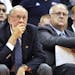 In this Monday, Nov. 14, 2011, photo, Syracuse basketball coach Jim Boeheim, left, watches the action with Bernie Fine, an assistant coach, during a c