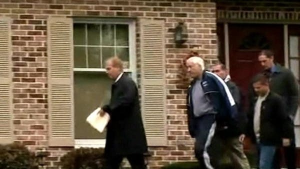 Ex-Penn State coach Sandusky arrested, faces new charges