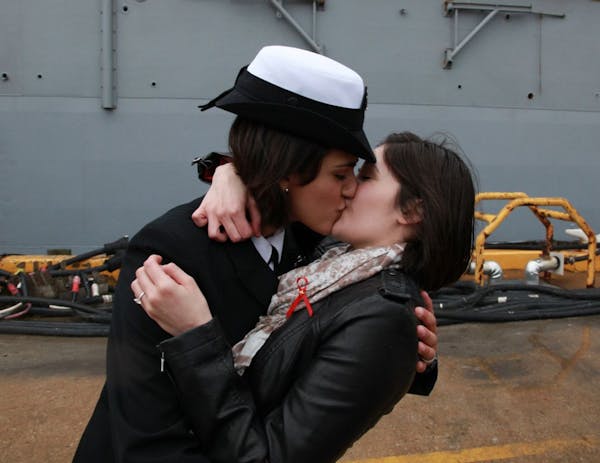 Female sailors share 'coveted' kiss