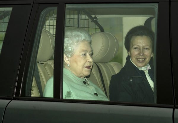 Queen Elizabeth II pays quick visit to husband