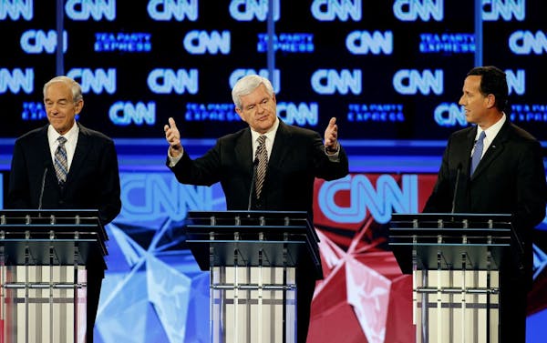 Candidates sharpen barbs in N.H. debate