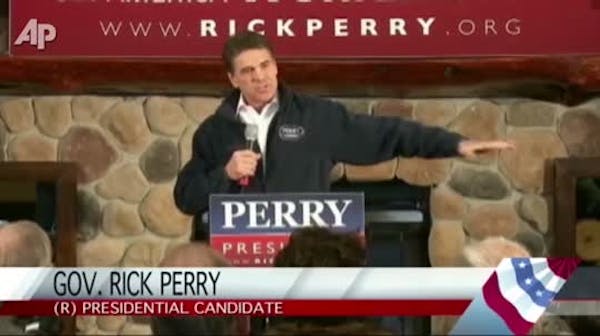 Perry hammers Santorum ahead of Iowa caucuses