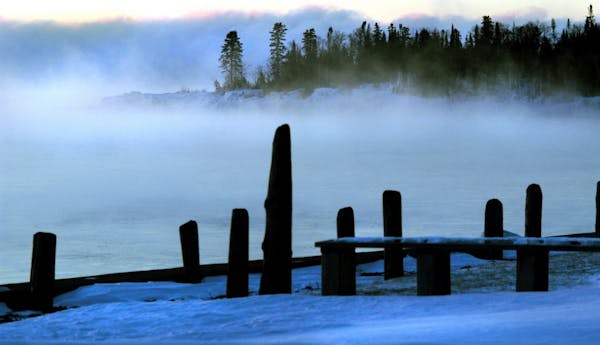 Artist Point was shrouded in fog rising off of Lake Superior in the early morning light.