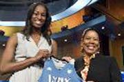 Notre Dame's Devereaux Peters, left, with WNBA President Laurel J. Richie.