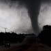 A tornado touches down in Lancaster, Texas south of Dallas on Tuesday.