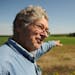 Edward Gillstrom stood in his hay field near where a highway interchange will be built in western Wisconsin. Many people in St. Croix County are outra