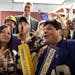 Vikings fans gathered in the office of Mayor R.T. Rybak, at rear, to celebrate the Minneapolis City Council vote to build a Vikings Stadium, Friday, M