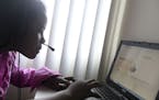 Tangeline Jackson, 10, worked on reading comprehension with an Educate Online tutor for an hour at her home in St. Paul in March. It’s the second tu