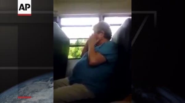 Bus monitor bullied on video won't seek charges