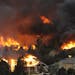 An entire neighborhood burns near the foothills of Colorado Springs, Colo. on Tuesday, June 26, 2012. A towering wildfire destroyed dozens of houses o