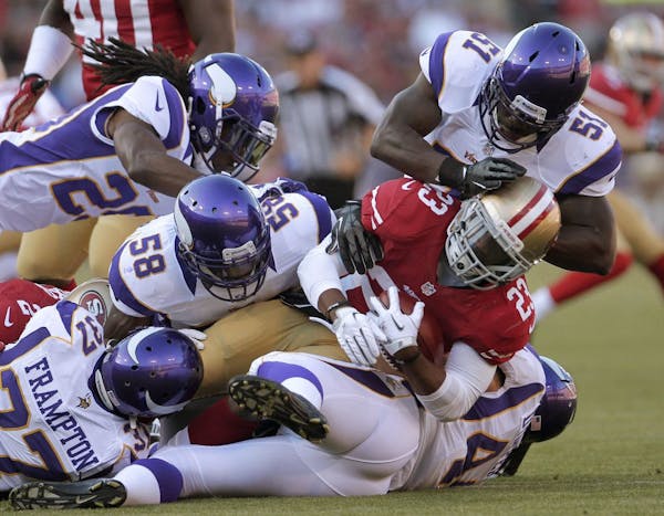 Gang tackling by the Vikings' run defense, like this effort on 49ers running back LaMichael James on Friday, didn't happen often enough in the team's 