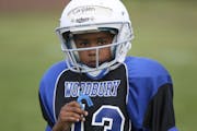 Cayden McCorkel, 9 waited for instructions during practice for the Woodbury Royals on Wednesday. Last year, McCorkel suffered a concussion that kept h