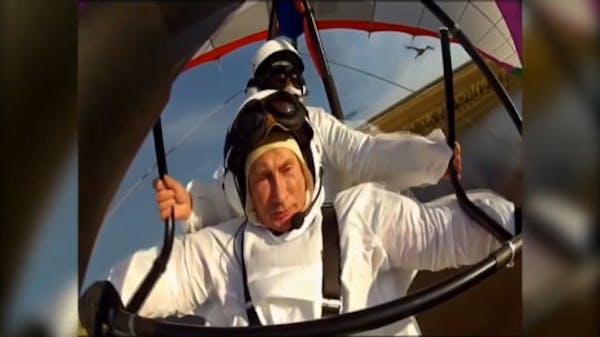 Putin flies hang glider leading siberian cranes