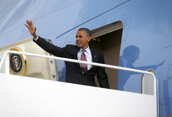 President Barack Obama waves as he boards Air Force One before his departure from Andrews Air Force Base, Md., Wednesday, Sept., 5, 2012. Obama is tra
