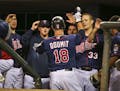 Twins Ryan Doumit celebrated his solo home run in the dugout in the the eighth inning during a baseball game between the Minnesota Twins and the Cleve