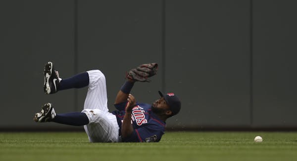 Twins center fielder Denard Span was injured while trying to make this catch against Tampa Bay on Aug. 12 and has been out since.