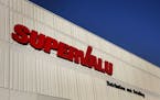The Supervalu Inc. logo is displayed at a distribution center in Hopkins, Minnesota on Monday, Jan. 9, 2012. Inventories at U.S. wholesalers rose 0.1 