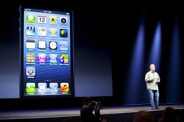 Phil Schiller, Apple's marketing chief, talks about the additional vertical space on the new iPhone 5 screen during the company's iPhone event at the 