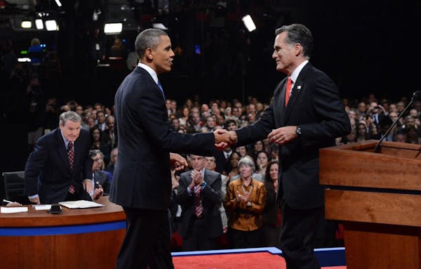 Obama, Romney clash on economy in first debate
