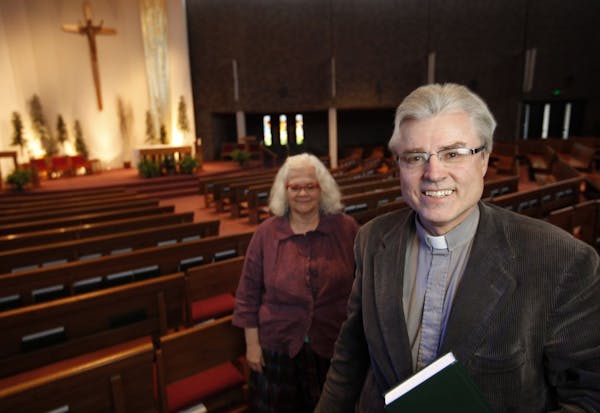 Shown at a previous parish in Bloomington, the Rev. Mike Tegeder serves in Minneapolis.
