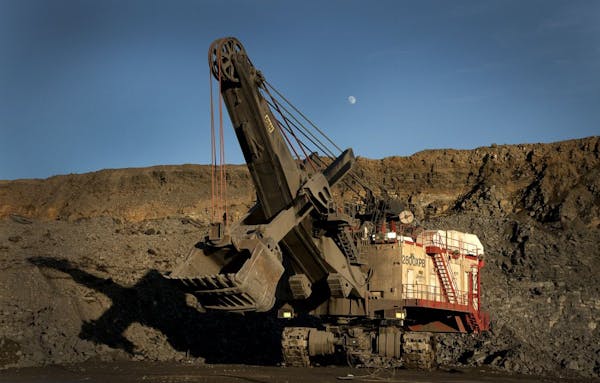 A P&H electric rope shovel works at an open pit mine at the Hibbing Taconite Co. pellet manufacturing plant, operated by Cliff's Natural Resources Inc