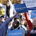Supporters wave signs during a rally outside the Norton Center on the campus of Centre College before tonight's vice presidential debate.