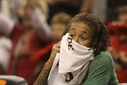 Seimone Augustus sits dejected in the closing minutes of the game against the Indiana Fever during Game 4 of the WNBA Finals