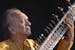 FILE - In this July 19, 2005 file photo, Indian musician Ravi Shankar performs during the opening day of the Paleo Festival, in Nyon, Switzerland. Sha