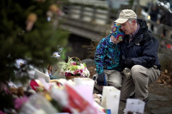 Newtown residents ask, "Why did this happen?"
