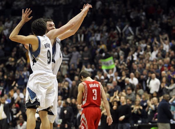 Wolves stars Ricky Rubio and Kevin Love celebrated Saturday's victory voer Houston.