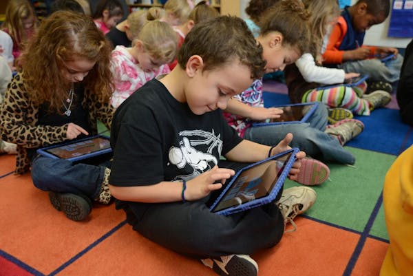 Kindergarten students at Royal Oaks Elementary School in Woodbury have begun using iPads in the classroom.