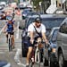 Bicyclists and cars co-exist while heading south in bike lanes amid heavy traffic along Portland Avenue., near E. Grant Street last year in Minneapoli
